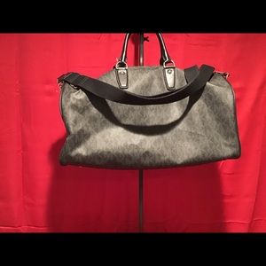 MK gray and black duffel bag